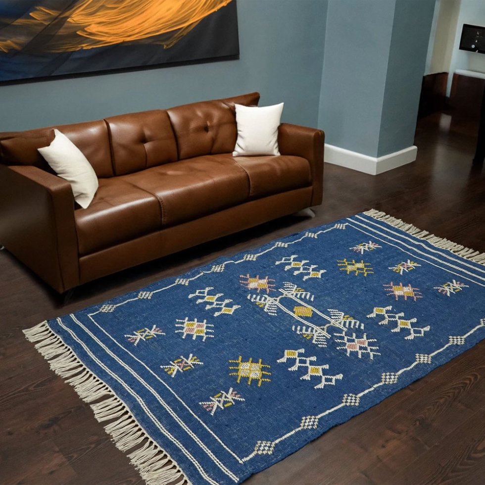 Niebieski dywan kilim w stylu azteckim