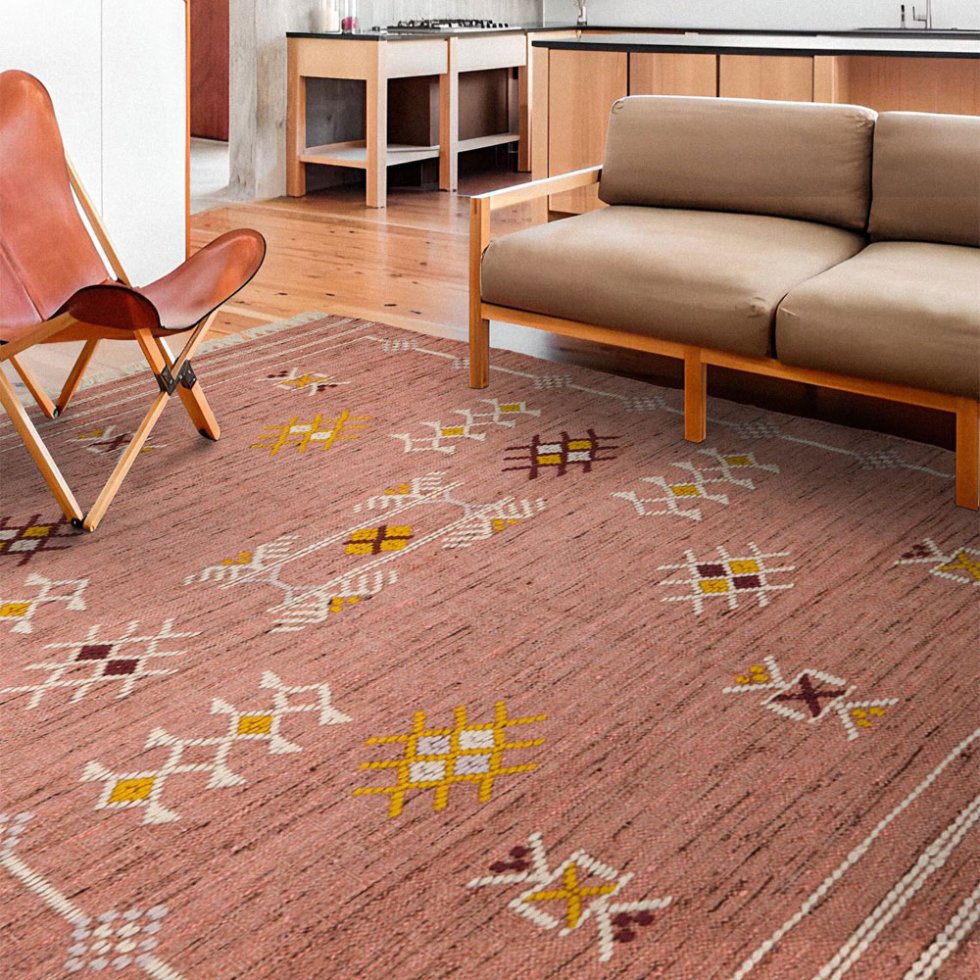 Różowy dywan kilim w etnicznym stylu azteckim