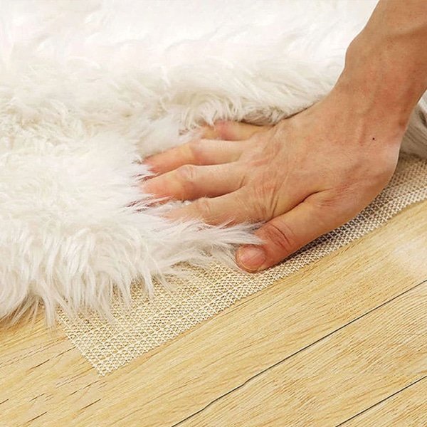 Biała antypoślizgowa podkładka pod kilim (PVC)