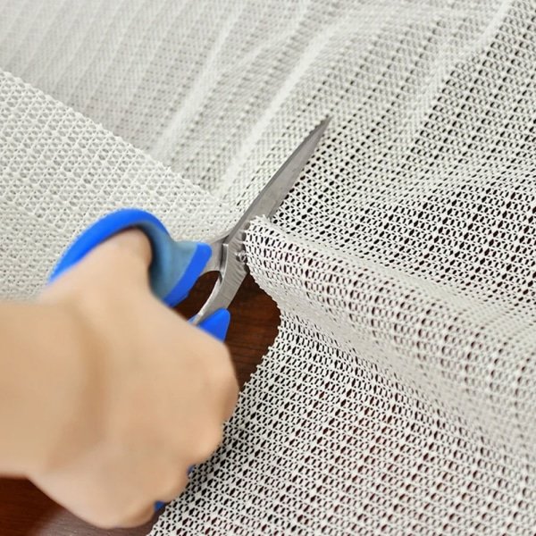 Biała antypoślizgowa podkładka pod kilim (PVC)